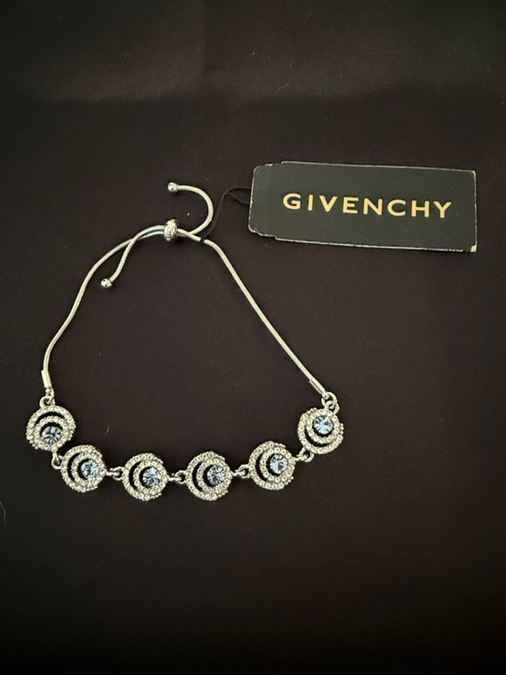 Givenchy Silver Tone Bracelet with Blue Crystal Medallions